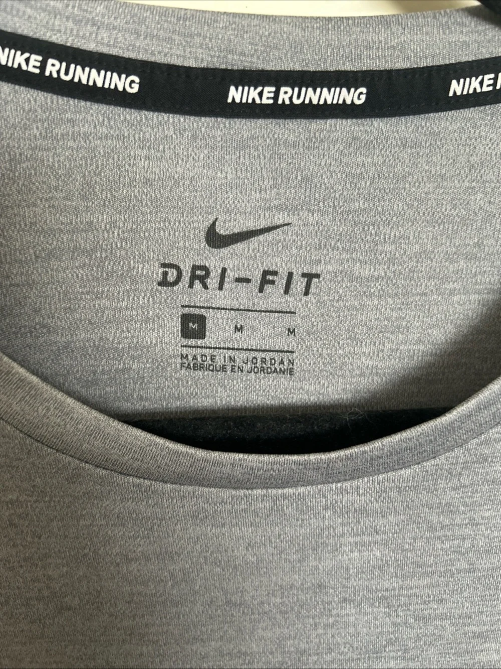 Nike Women's Grey Short-Sleeve Performance Tee with White Swoosh